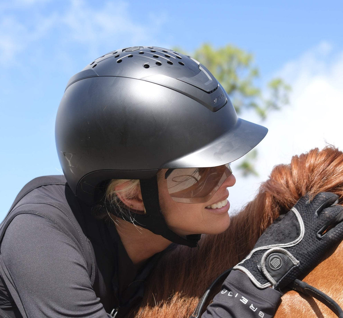Adult riding helmet and vest bundle with grey magnetic lenses