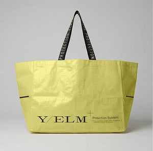 YELM hay bag 3 hanging filled with hay for feeding animals